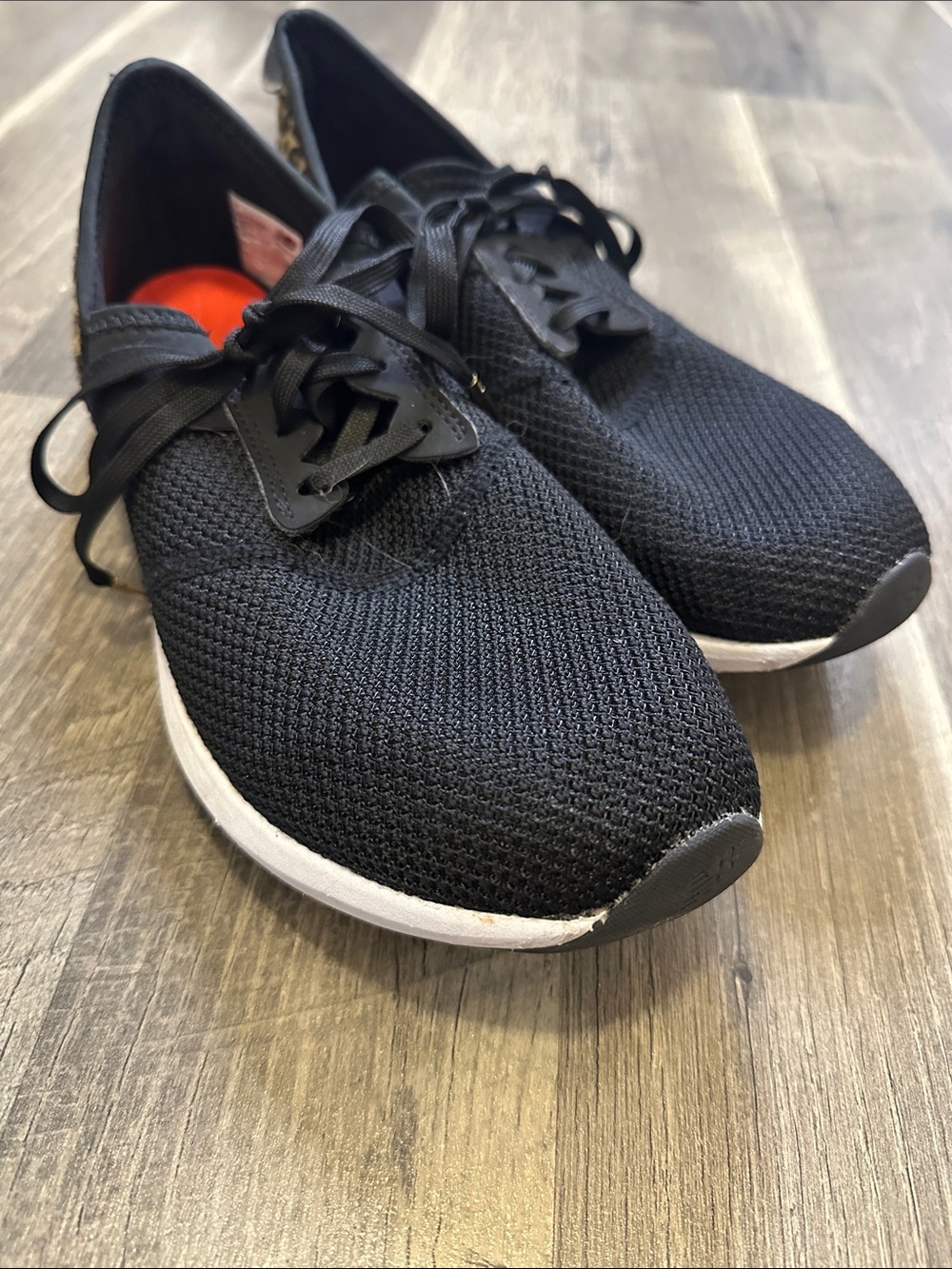 New Balance Women’s Black Knit Sneakers with leopard print accent